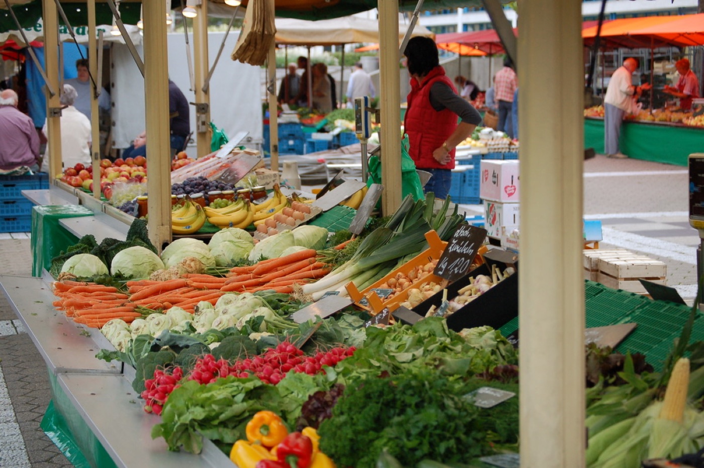 A market stall with an assortment of fresh vegetables